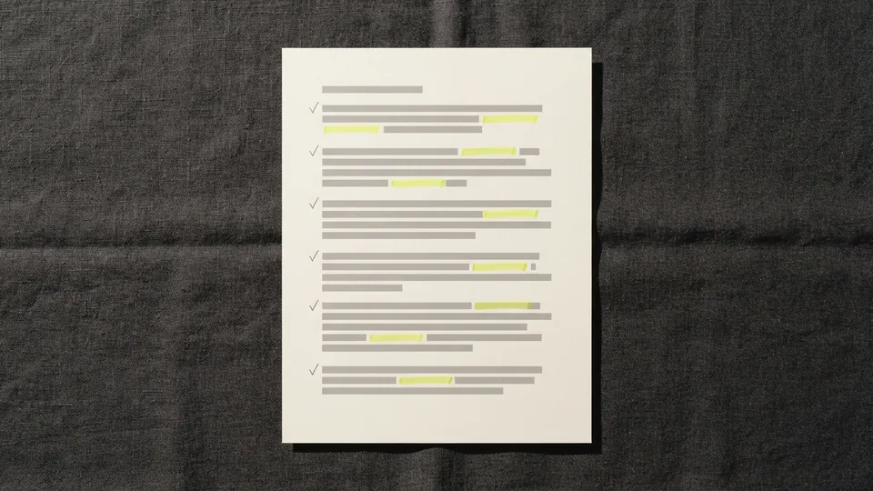 A printed page with an identical pencil tick beside every paragraph and a few short yellow marks